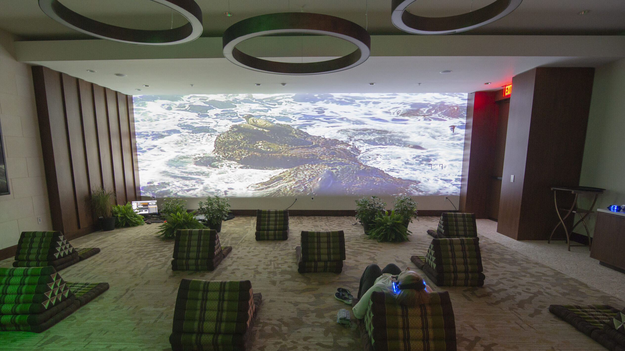 A Zen Den at JW Marriott Marco Island Beach Resort for mental wellness. Cushions let guests watch a projector on the wall.