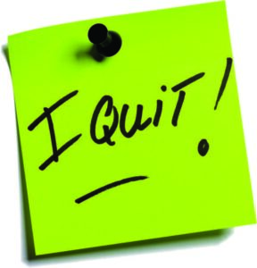 green sticky note that says I quit