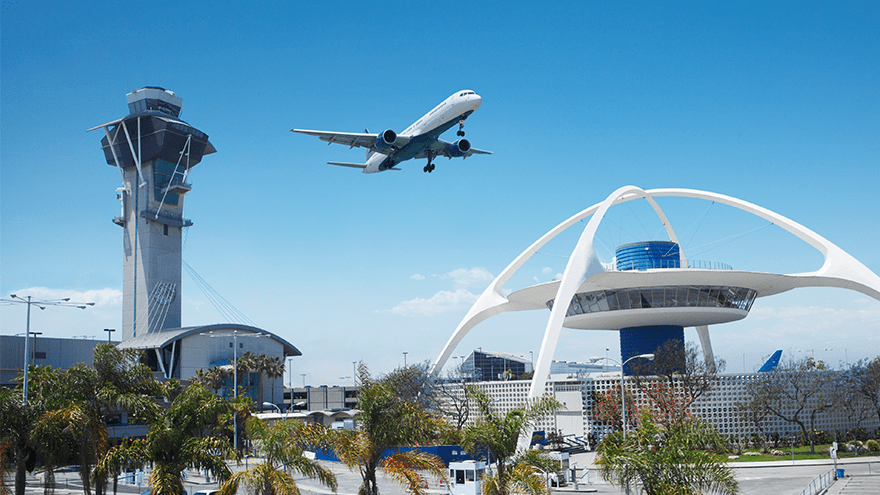 An airplane flying close to an air traffic control center