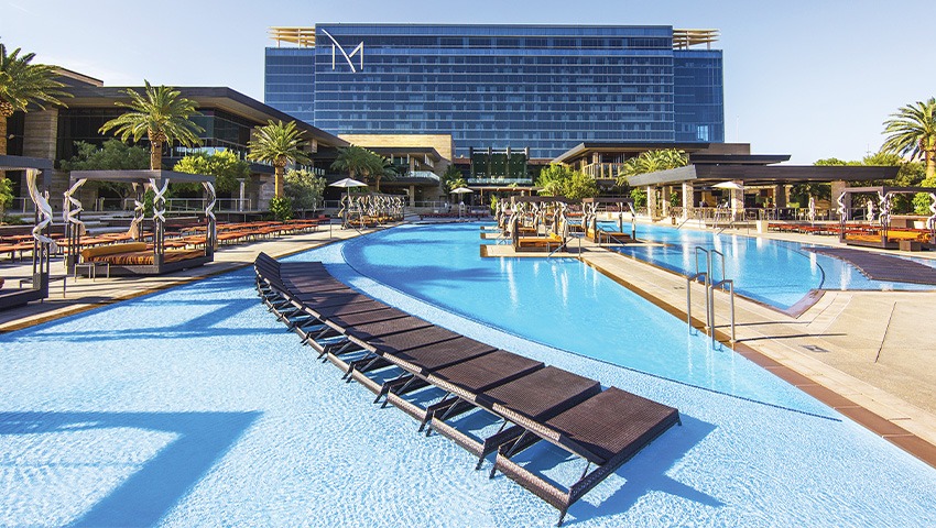 The M Resort in Las Vegas, a gaming property popular with meeting planners. The resort building is behind a shallow pool.