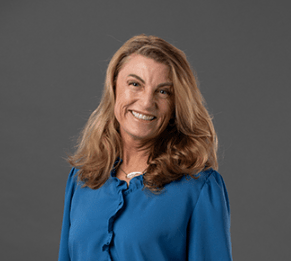 SITE CEO Annette Gregg in blue top 