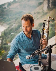 Joshua Sam Miller with instruments 