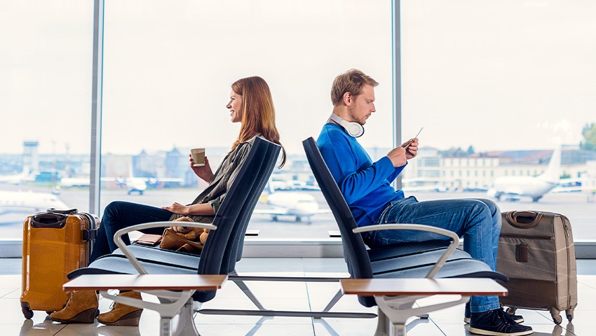 people waiting in airplane terminal
