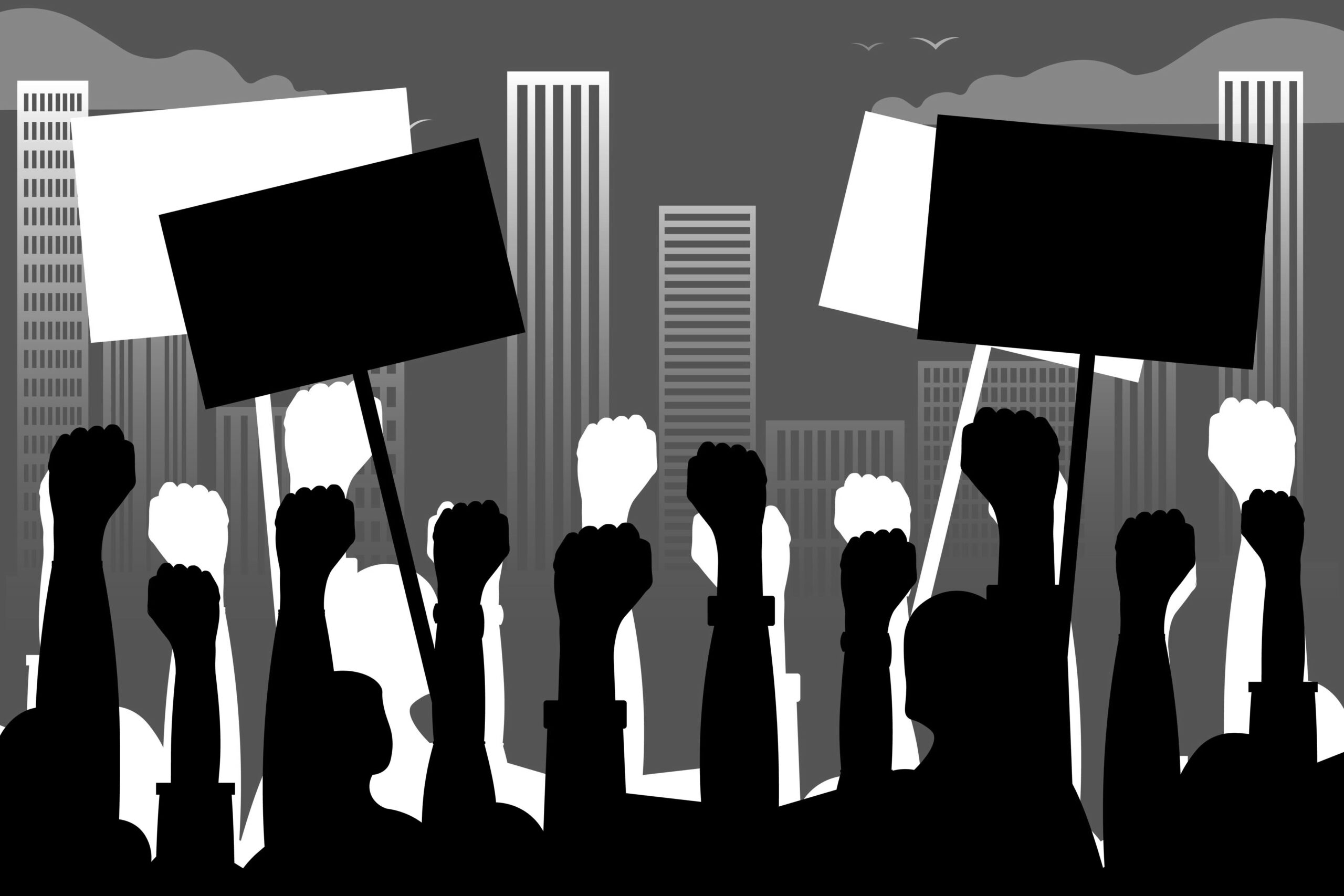 Silhouettes of hands with posters on the background of the city landscape, skyscrapers