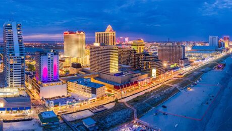 aerial shot of Atlantic city along the boardwalk at dusk