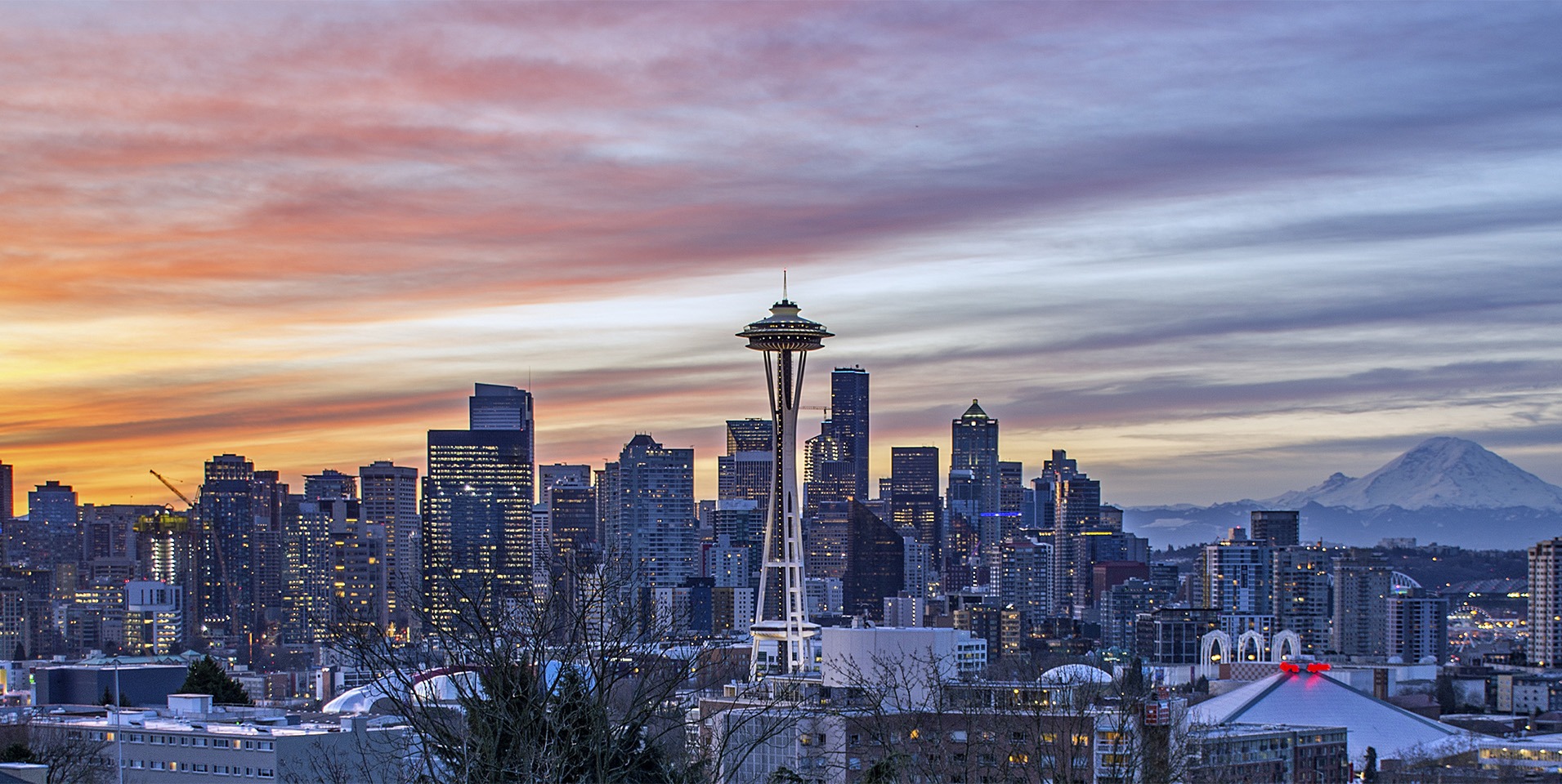 aerial shot of Seattle with Mt. Rainier in the distance