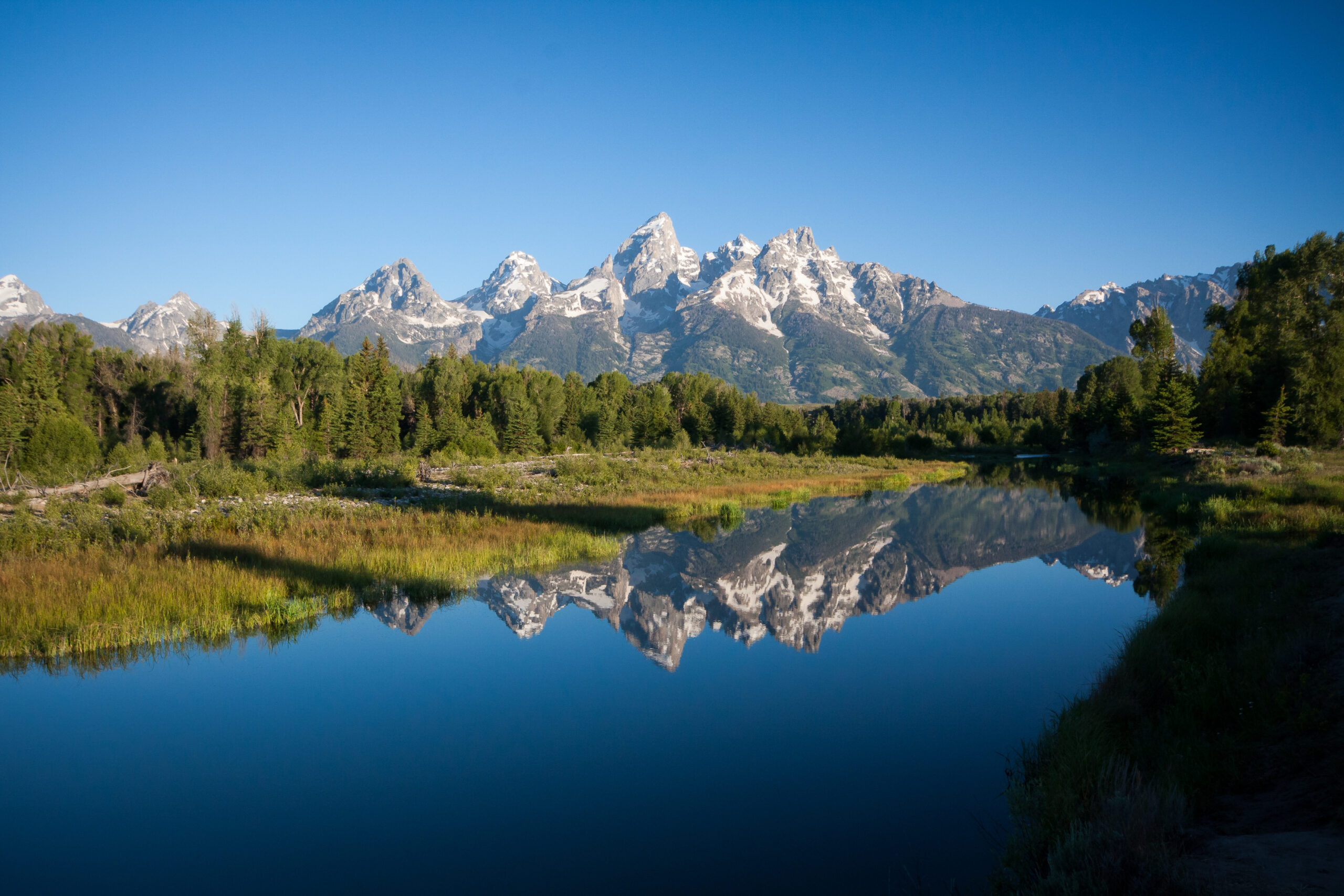 Grand Tetons peaks and their Reflections in Wyoming