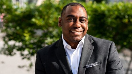 image of julius robinson wearing black sport coat and white dress shirt