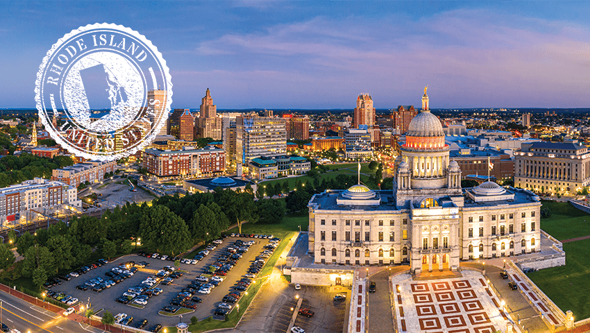 aerial view of Providence skyline and Rhode Island capitol building with white stamp of rhode island state