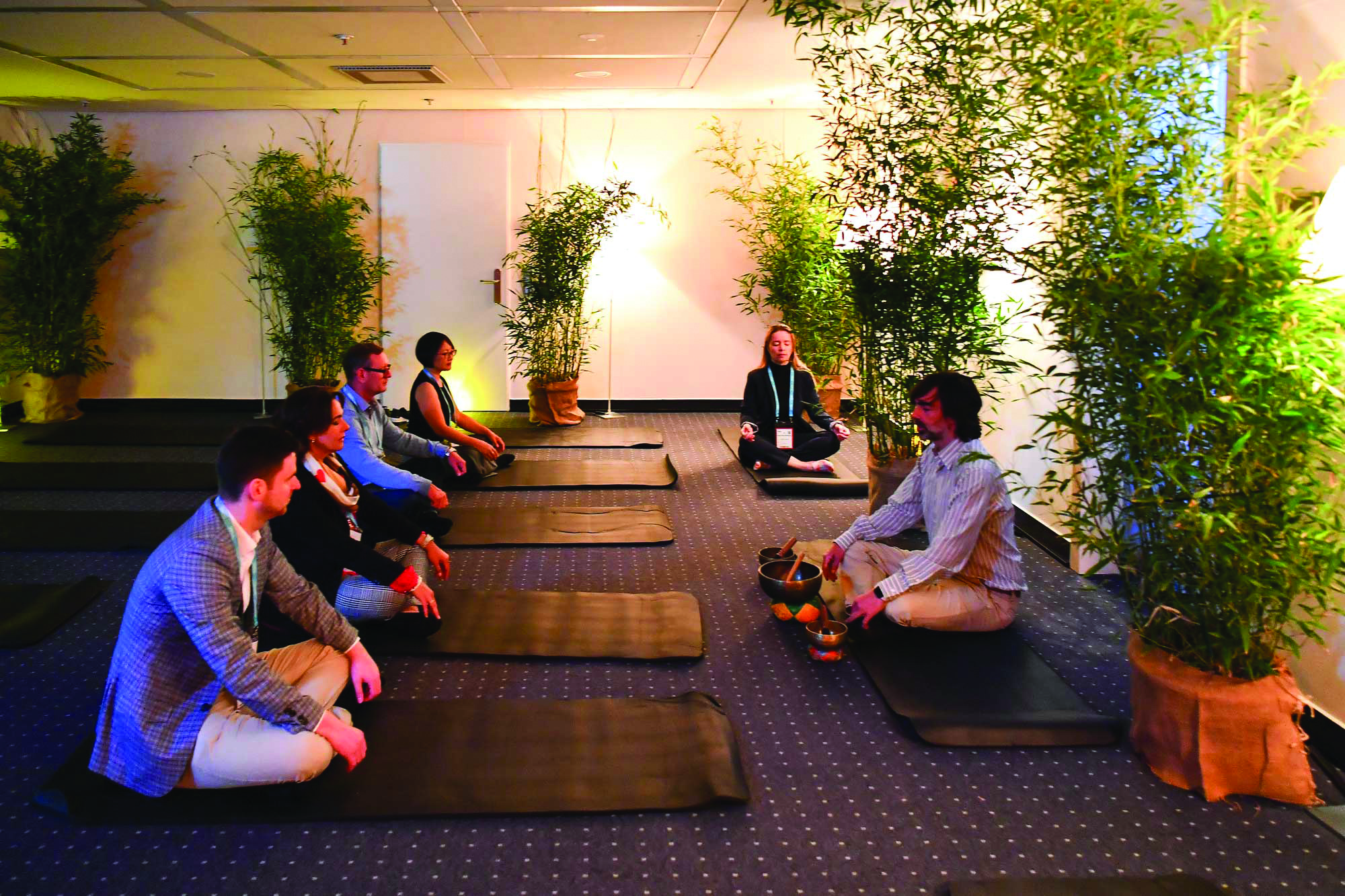 people in The Be Well Lounge at Imex Ameica 2022