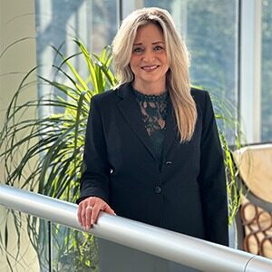 laurie frank wearing black blazer