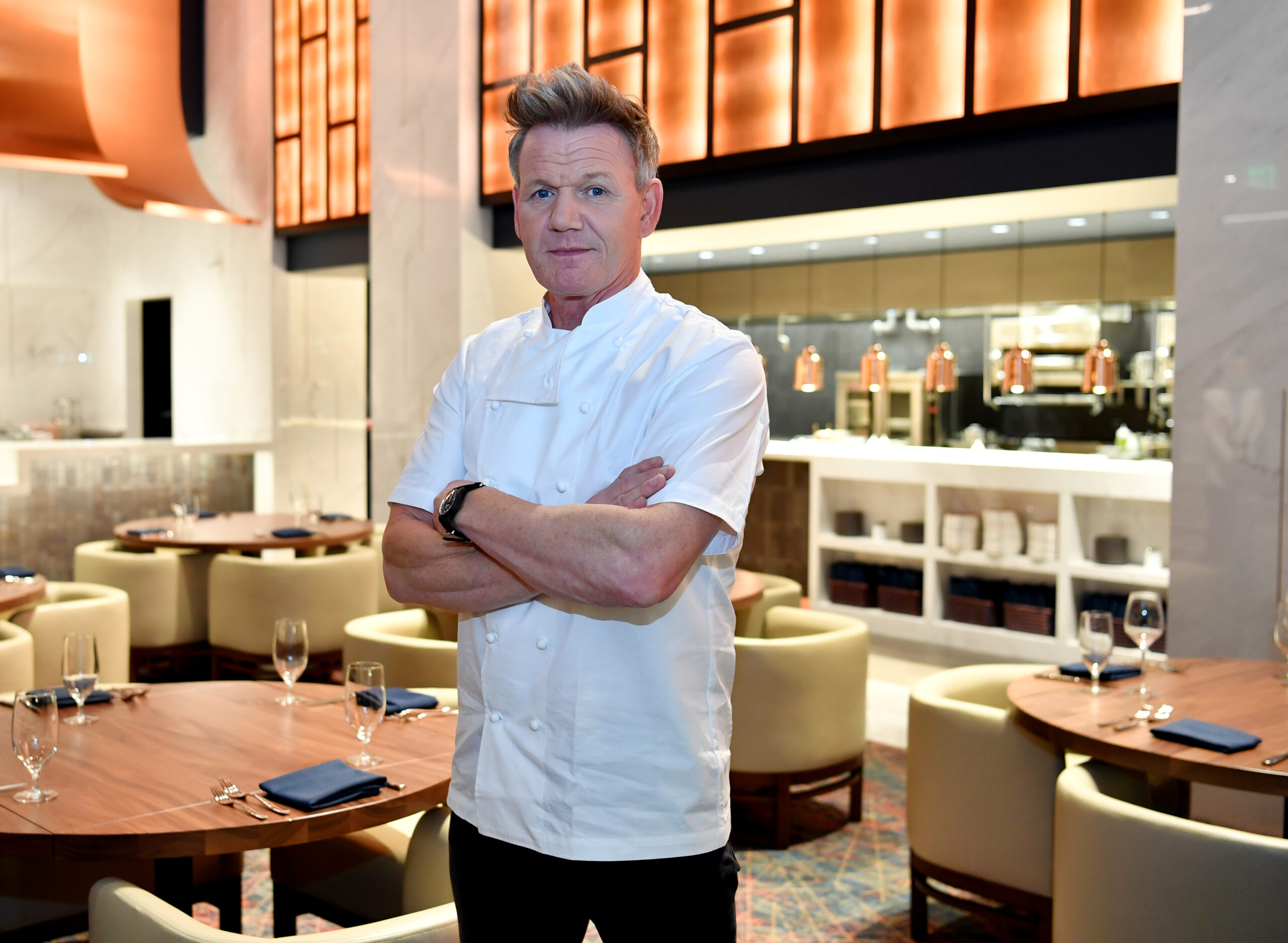 gordon ramsey posing in his restaurant in las vegas
