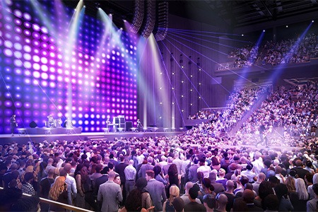crowd standing in front of stage with lights