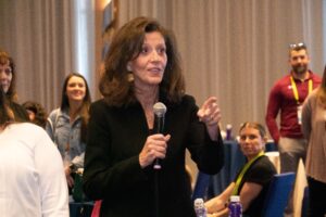 Debra Fine talking about art of small talk at Smart Meetings Extraordinary Experience