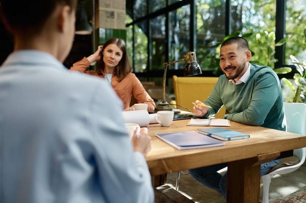 Business team discussing ideas in coworking space