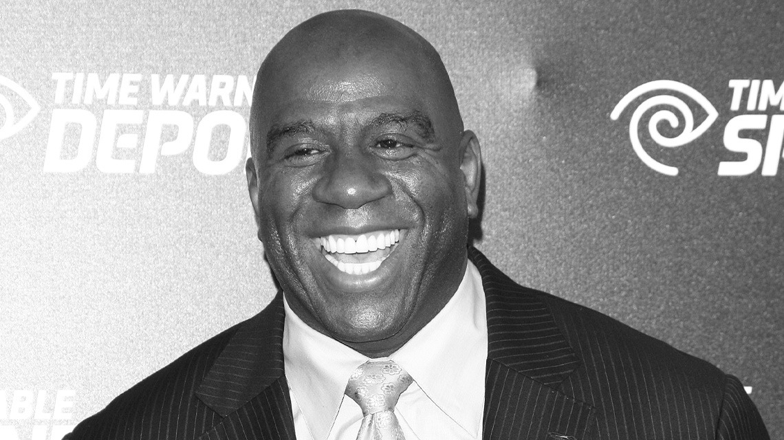 black and white image of man smiling