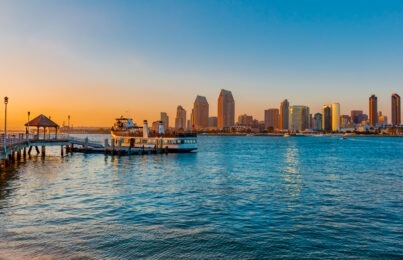 view of city skyline from ocean