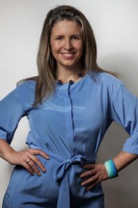 woman wearing blue silk long sleeve shirt