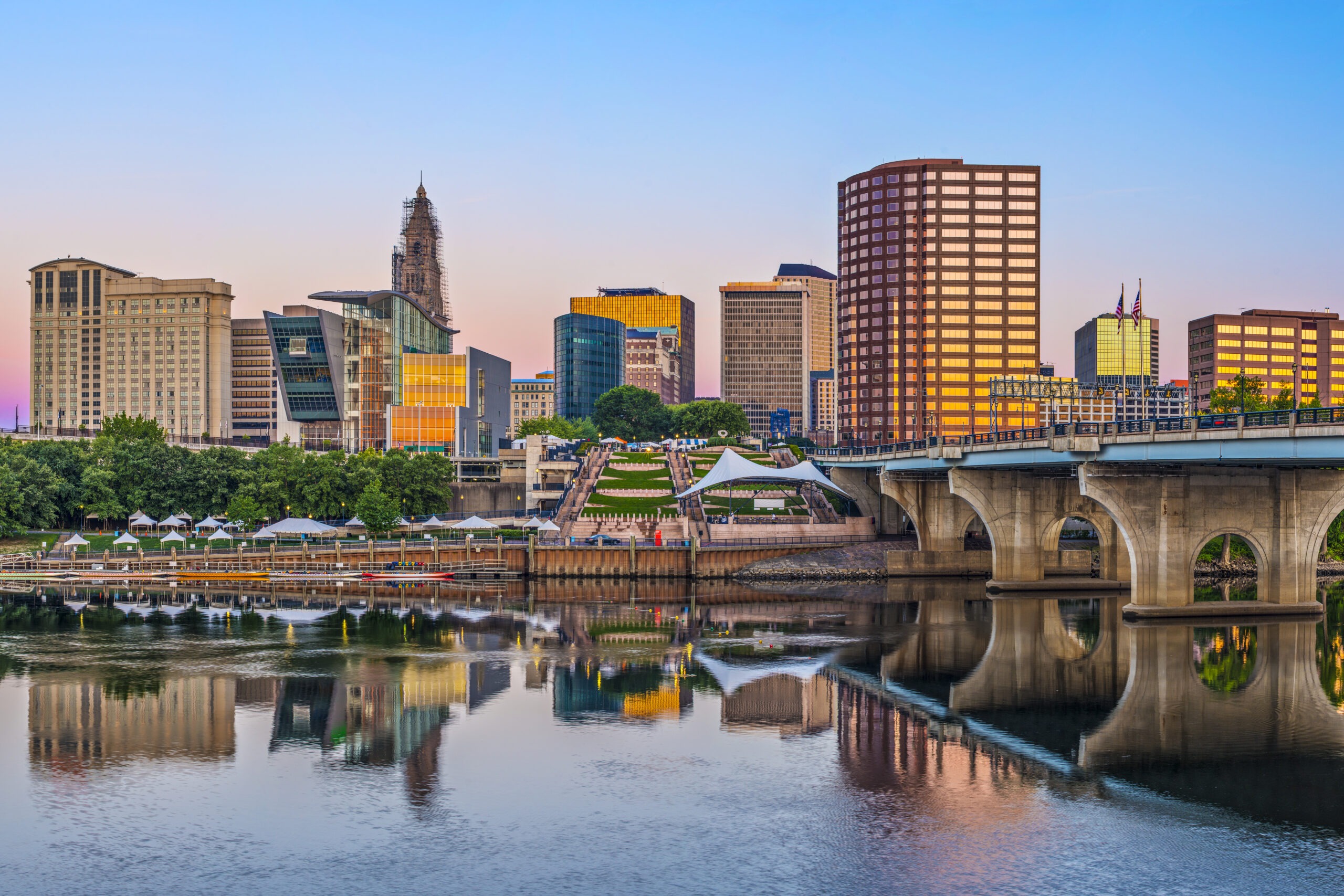 view of skyline of city from lake