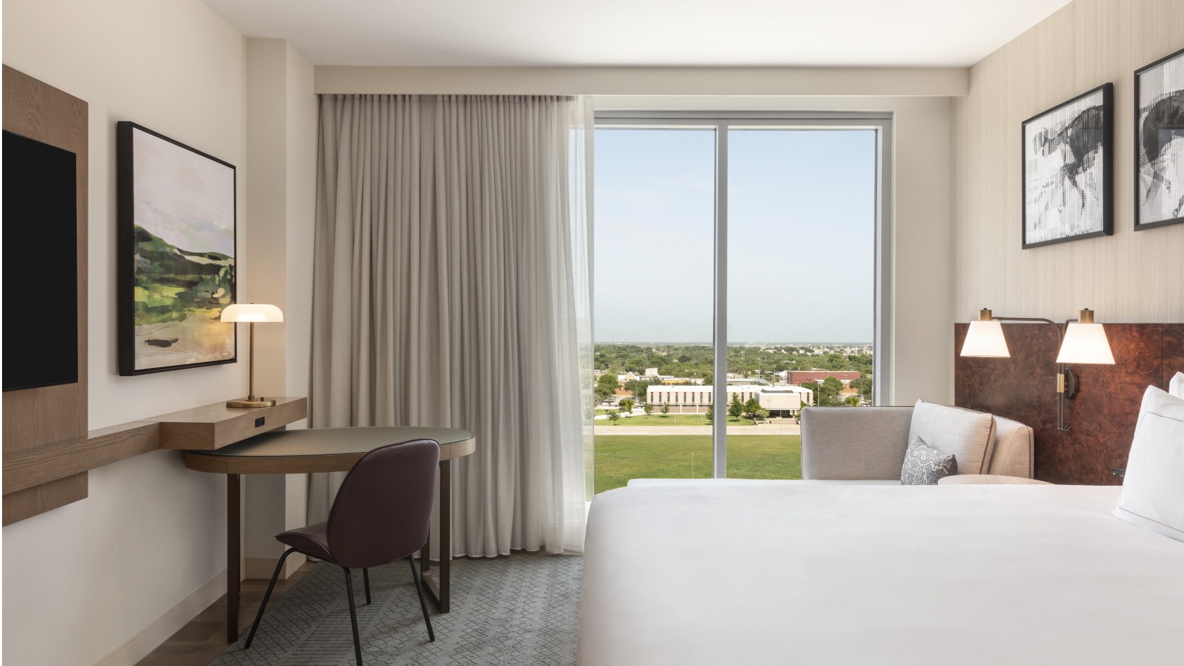 Hilton Abilene Downtown Convention Center standard king bedroom with city view