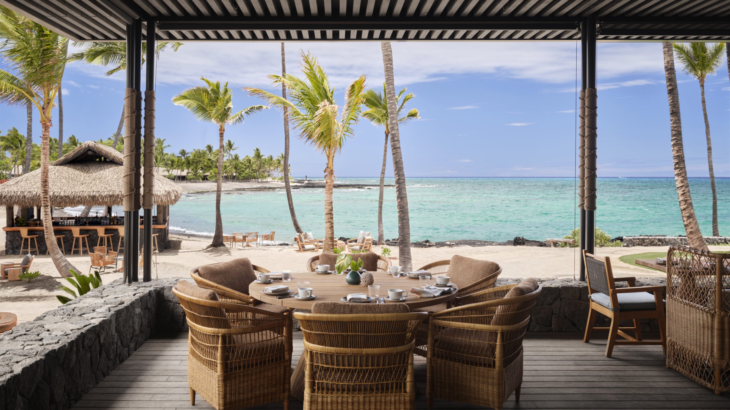 Kona Village Dining Area with a beach view