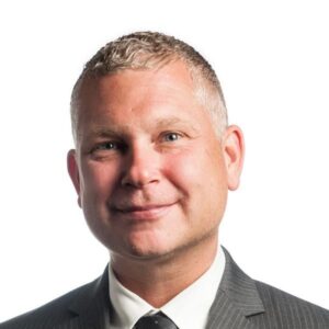 man wearing grey sport coat and white dress shirt