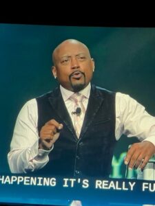 man speaking on stage