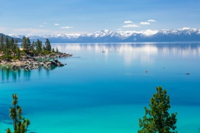 Lake Tahoe with view of Sierra Nevada snowy mountains