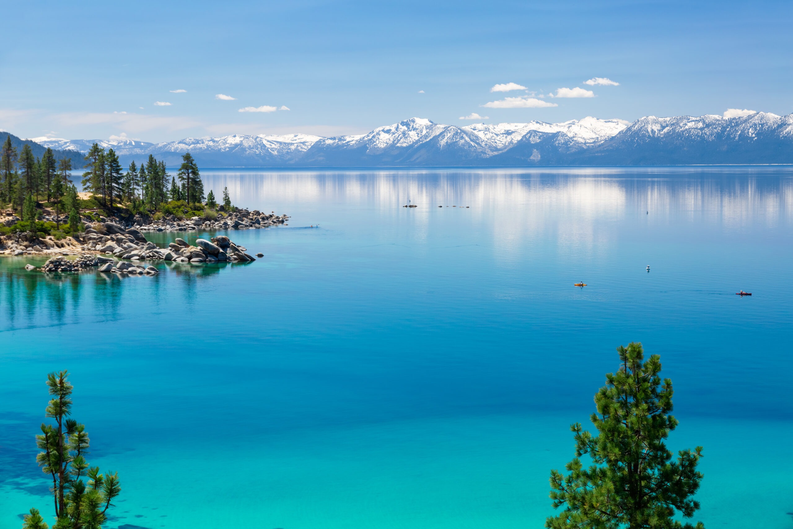 Lake Tahoe with view of Sierra Nevada snowy mountains
