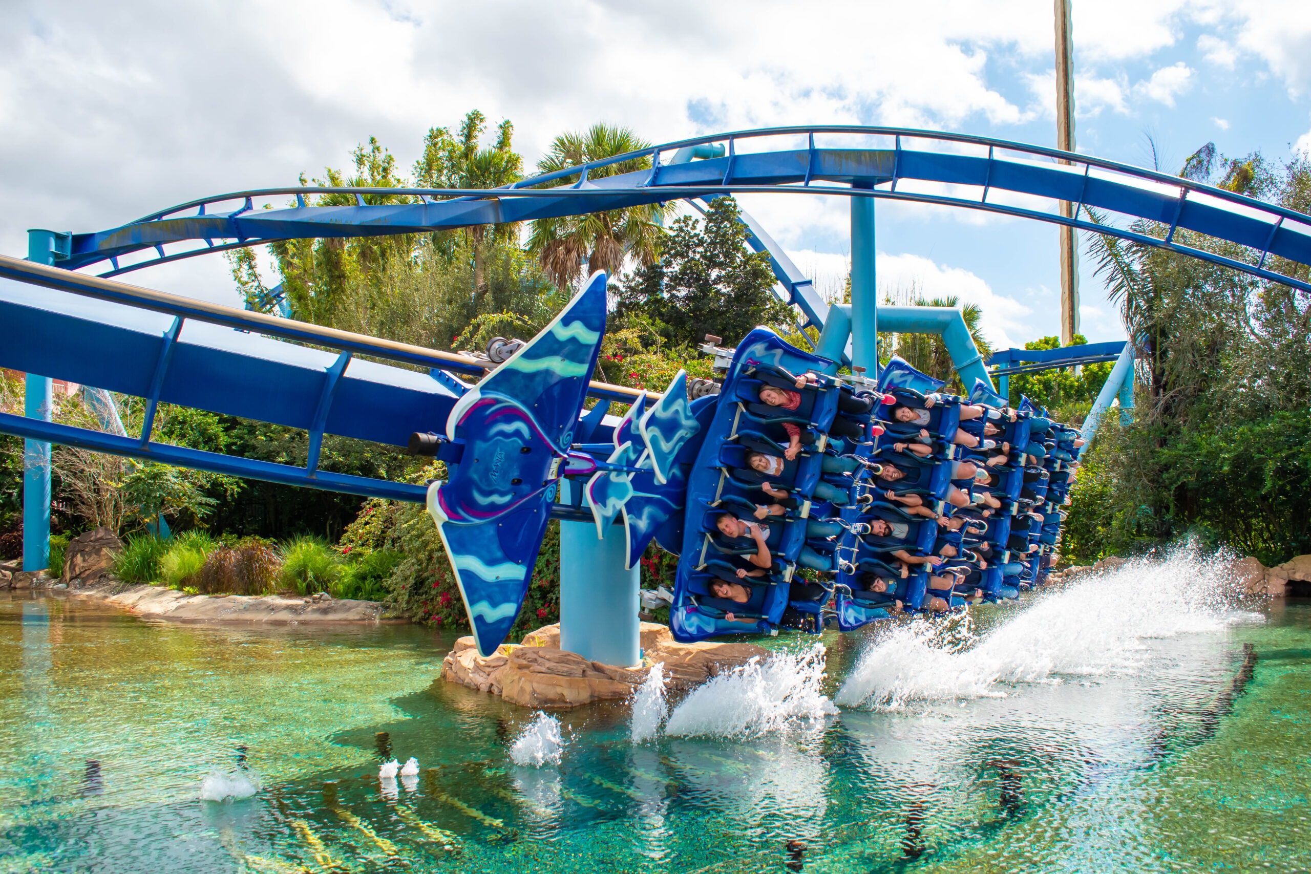 amusement park ride brushing against surface of water