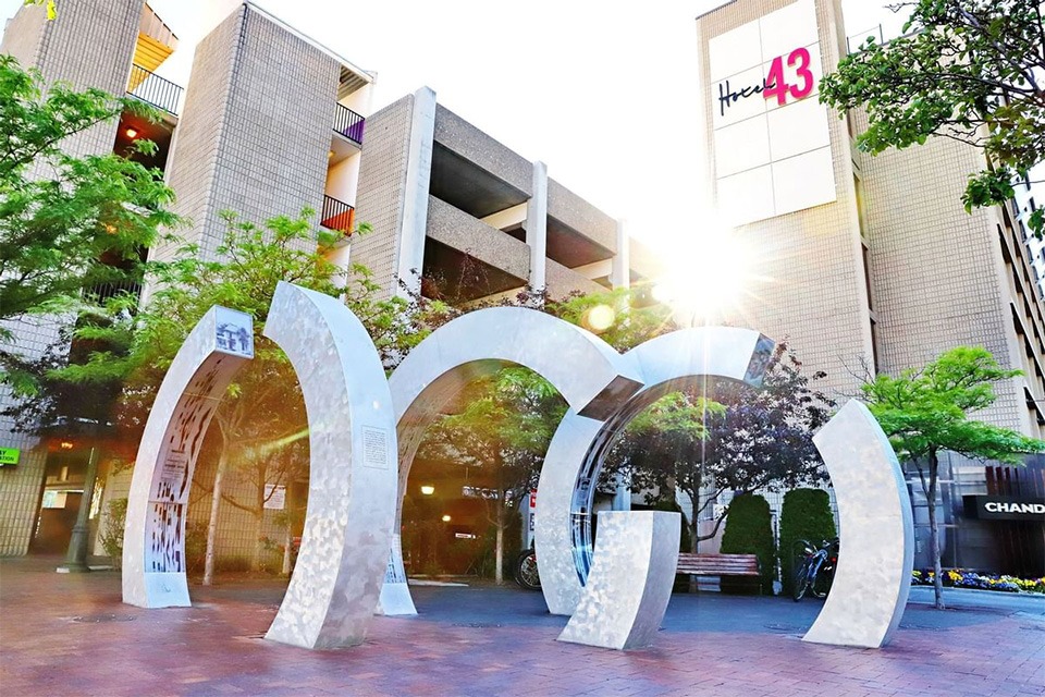 arched steel beams in front of hotel