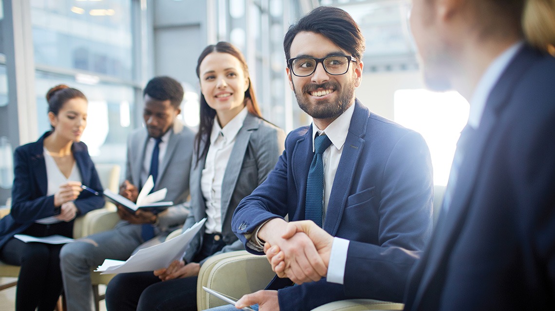businesspeople shaking hands