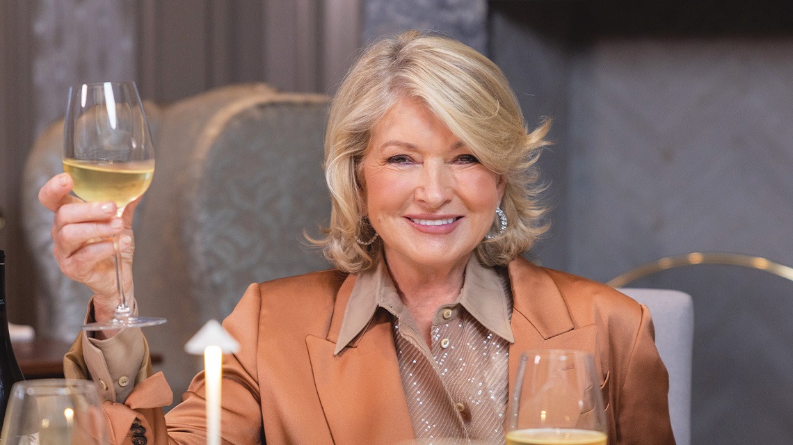 woman holding glass on champagne