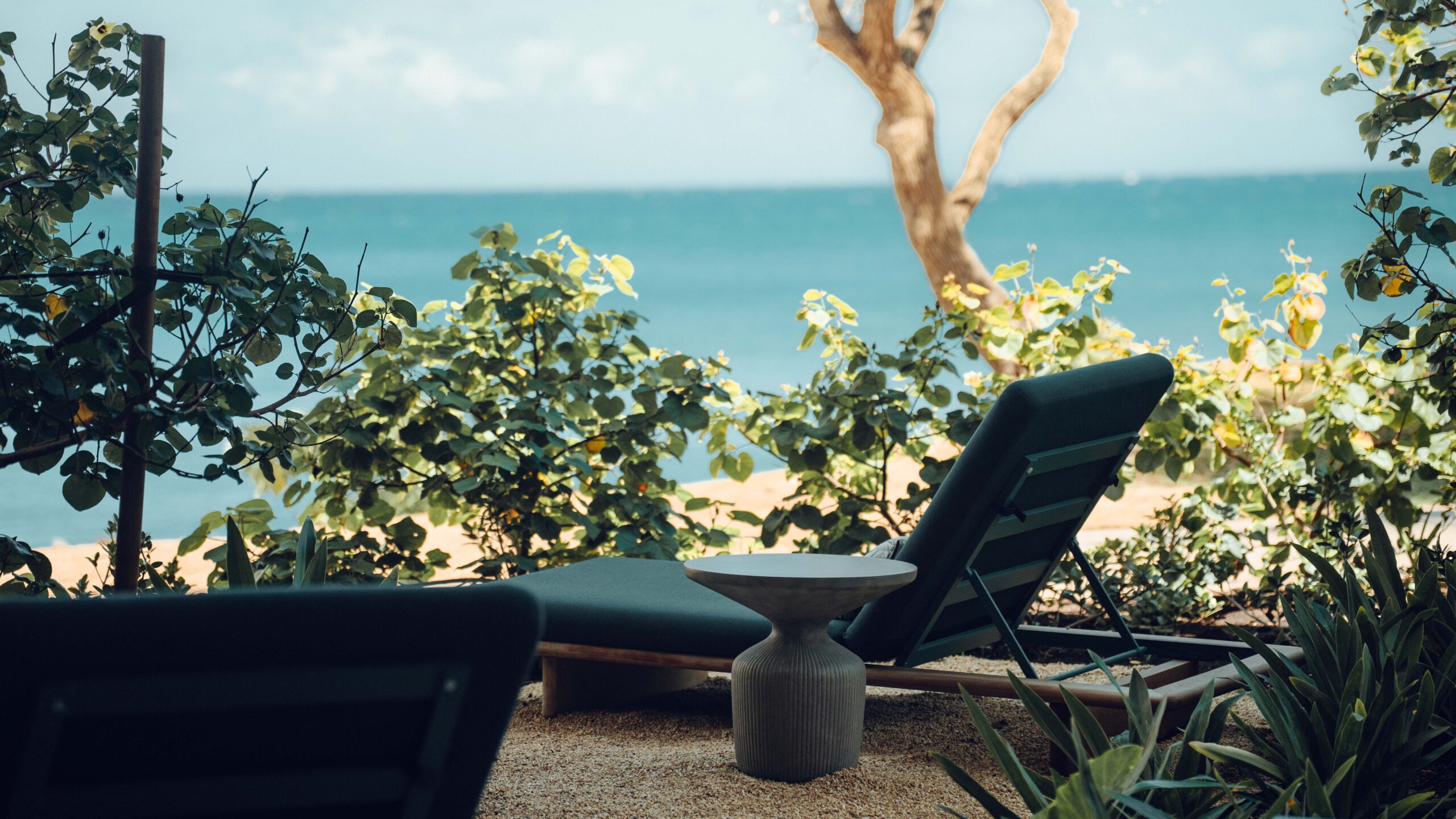 Outdoor lounge chair at Turtle Bay Resort Nalu Spa for New and Renovated Missing the Summer Sun Meet in Paradise feature image