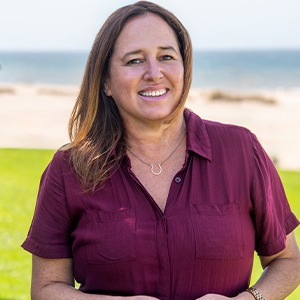 woman wearing purple short sleeve button up shirt