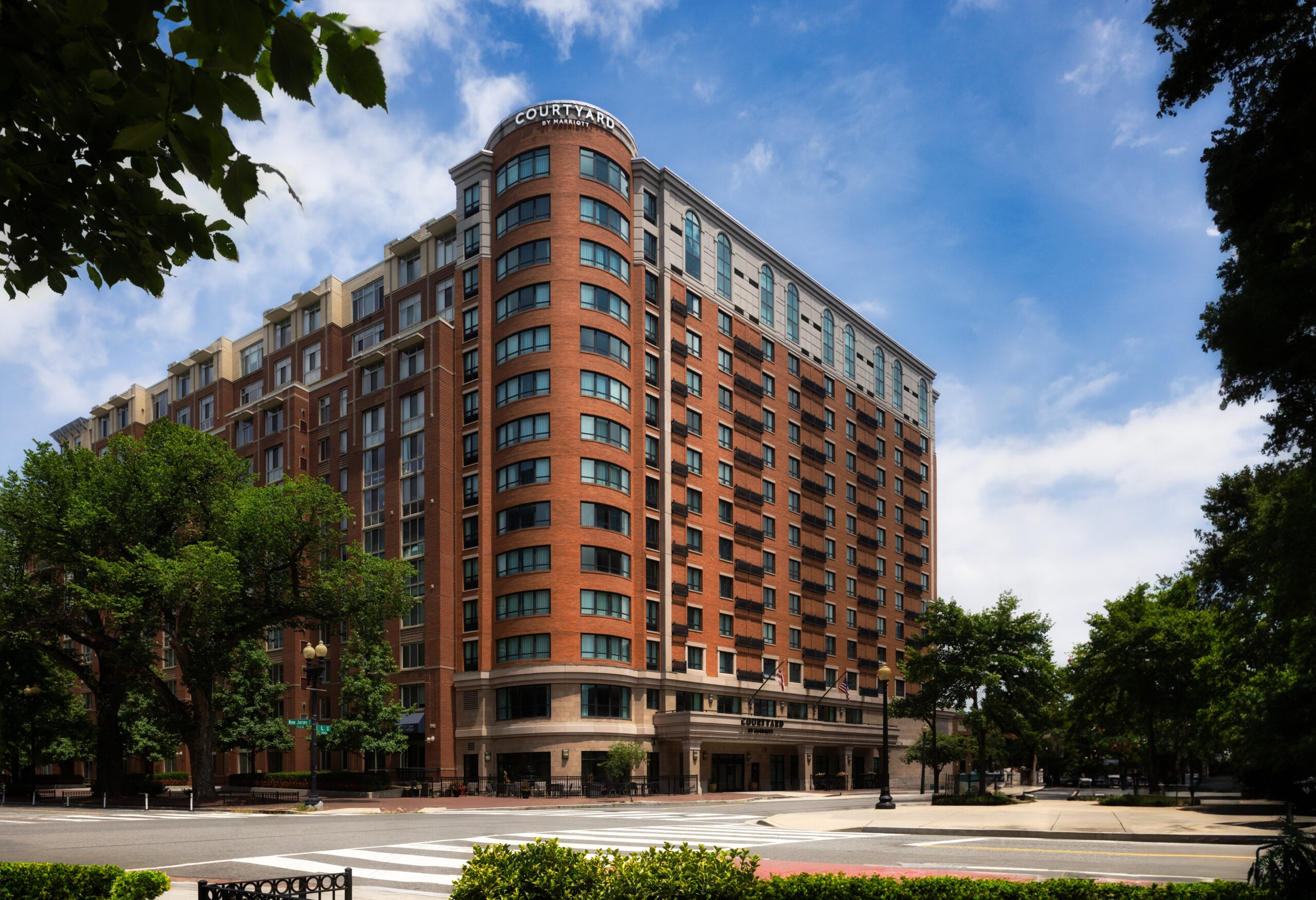 Washington Capitol Hill/Navy Yard is a brick multi story building on a city street in Washington D.C.