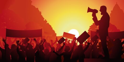 Concept of a strike and a demonstration with a man haranguing the crowd with a megaphone