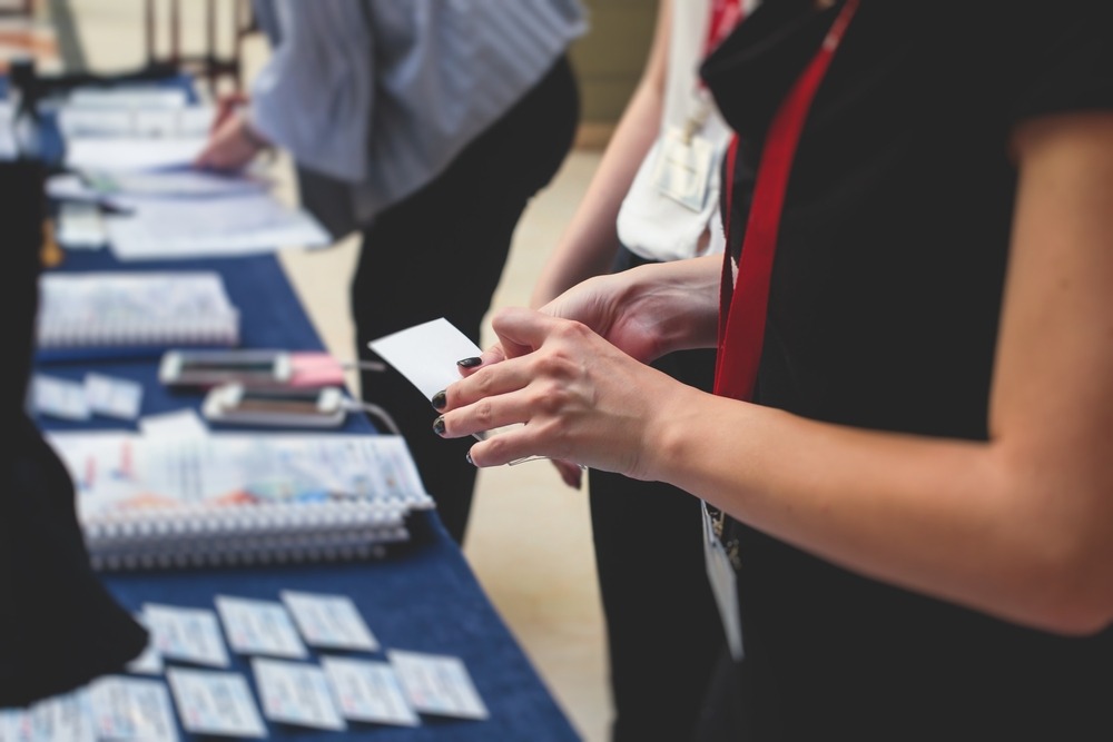 woman checking in on a conference