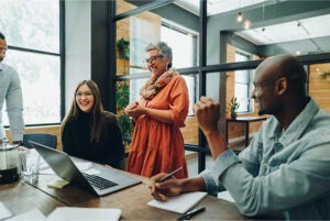 businesspeople talking in office