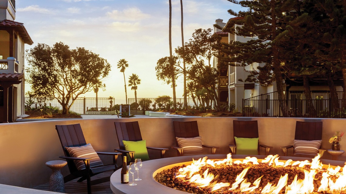chairs surrounding fireplace