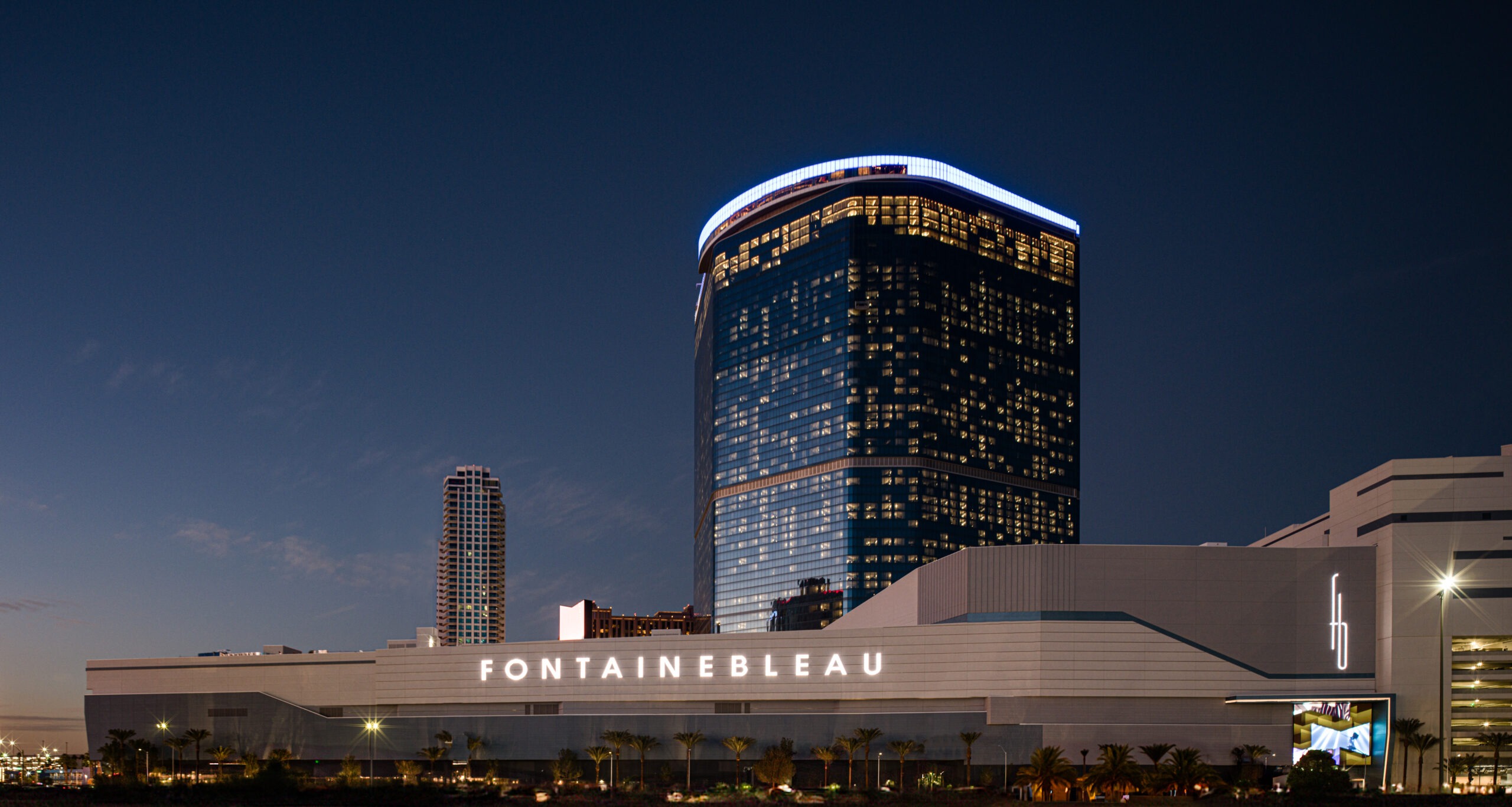 wide shot at hotel property at night