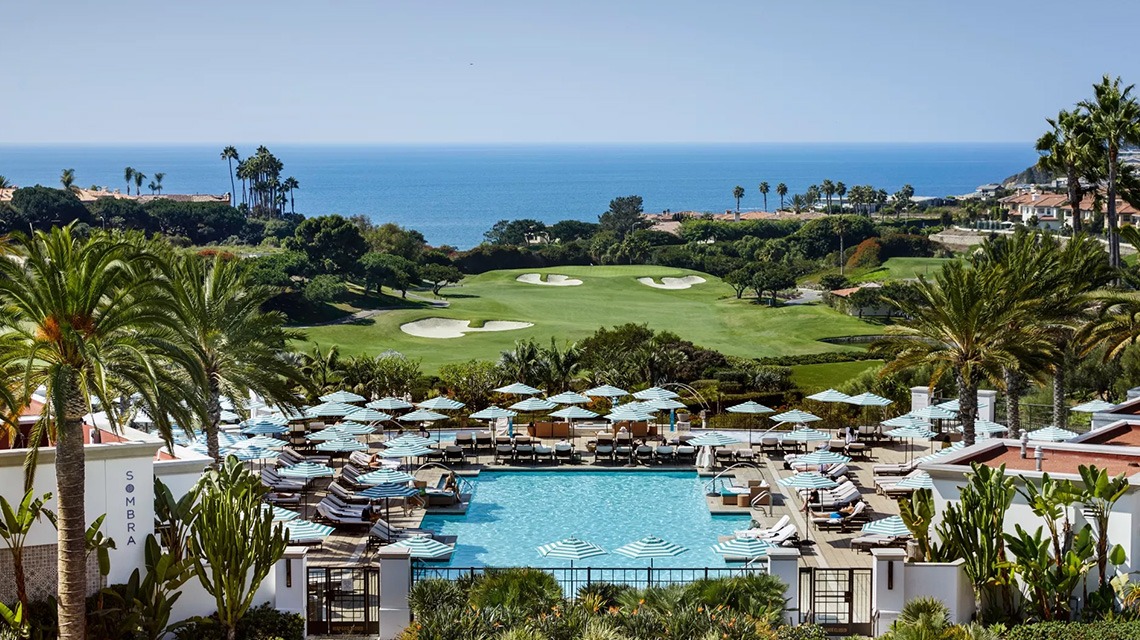 hotel pool and golf course in background