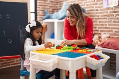 childcare worker working with kid
