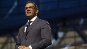 close up shot of man in grey suit