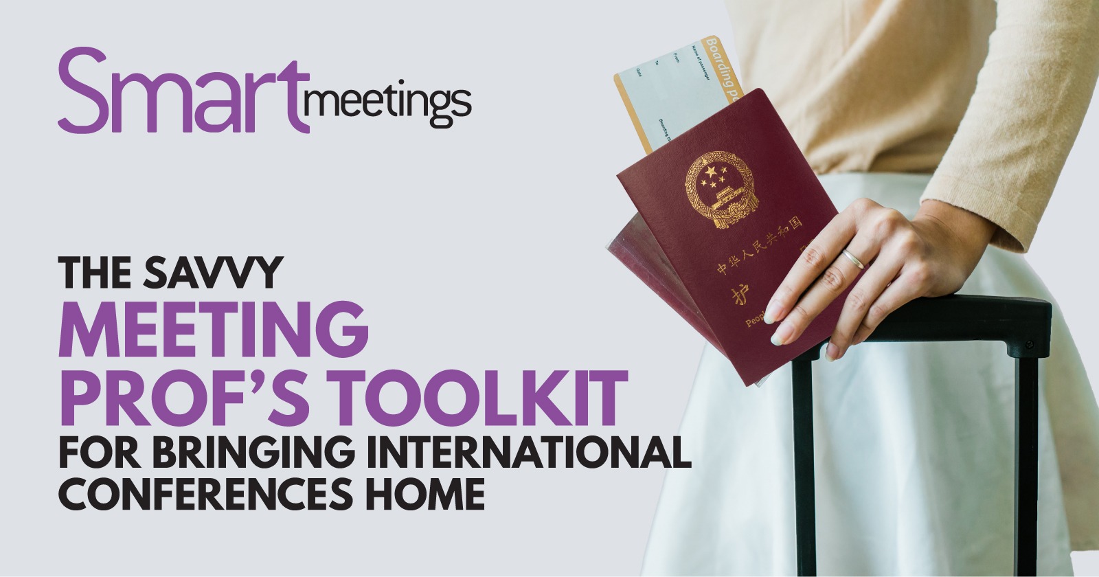 travelers hand resting on suitcase handle with passport in hand
