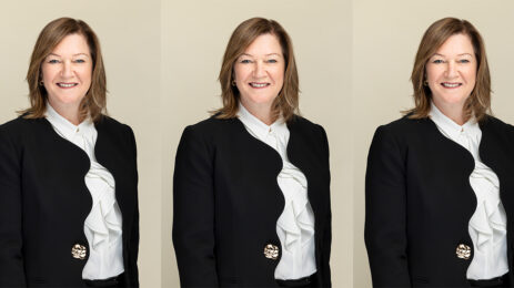 woman in black coat and white shirt