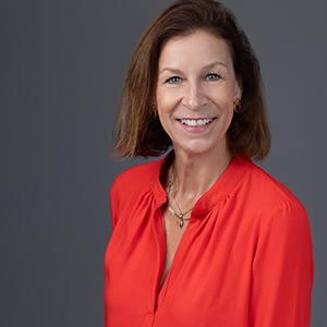 Headshot of Marla Kelly, complex director of sales and marketing at Romer Waikiki at the Ambassador