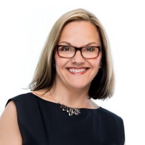 woman in glasses smiling