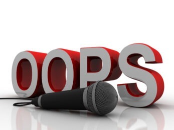 "oops" behind microphone