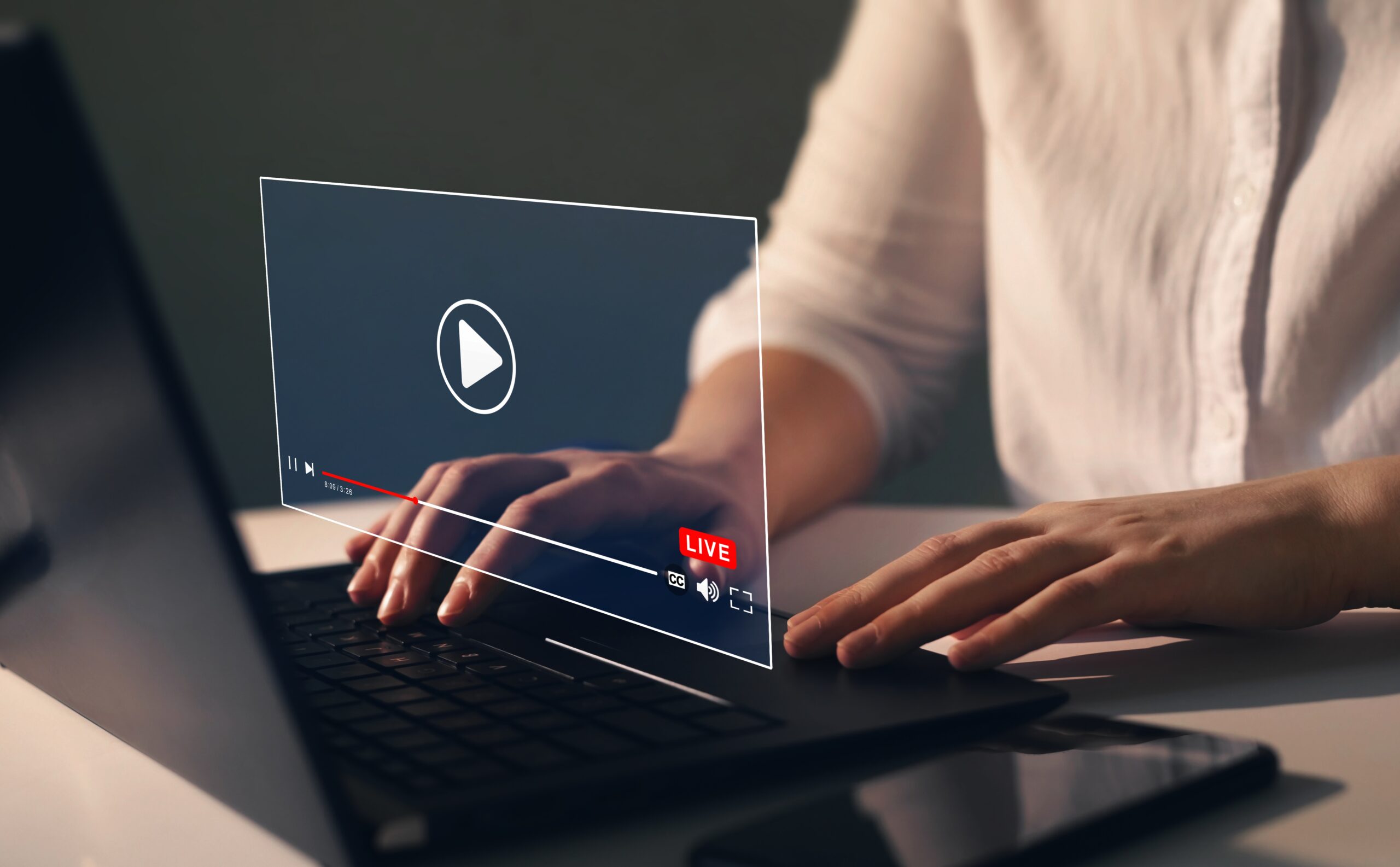 Businesswoman watching a live stream